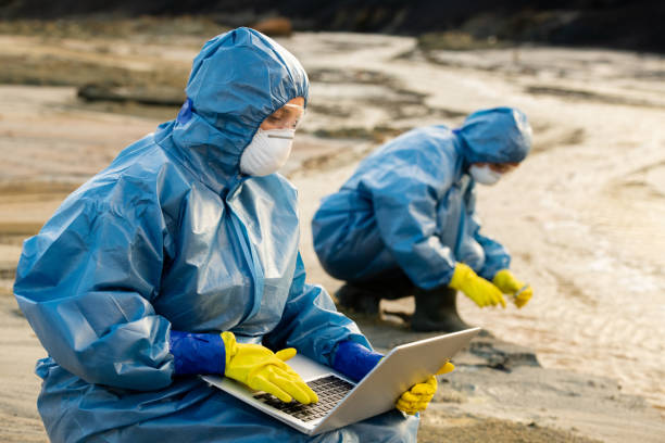 istock Ecologist entering data about characteristics of polluted water and soil 1266639464