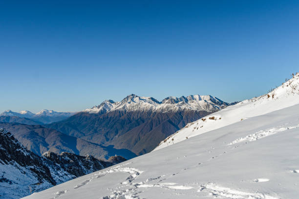 istock Snow covered beautiful mountain peaks 1266640827