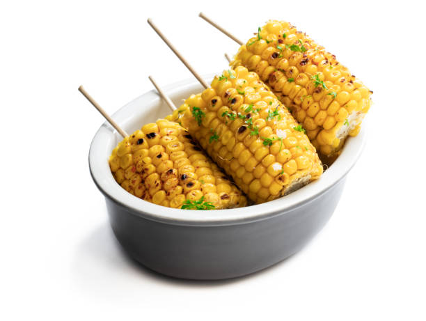 istock Grilled sweet corn on the cob isolated on white 1266642225