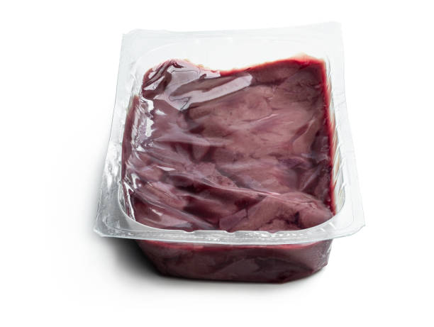 istock Raw pork liver in a pack isolated on white 1266642251