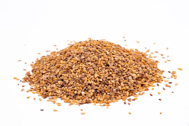 istock Sesame seeds isolated on white background top view 1266642340