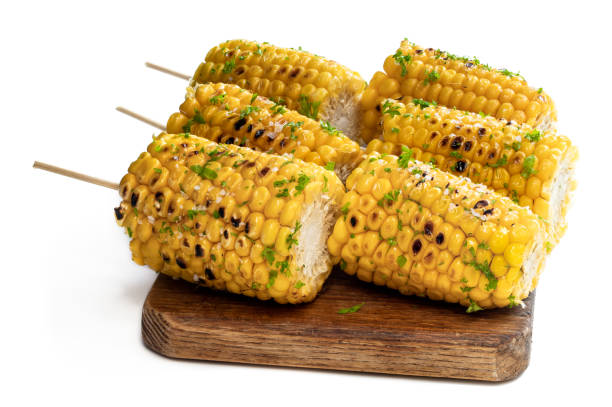 istock Grilled sweet corn on the cob isolated on white 1266644076