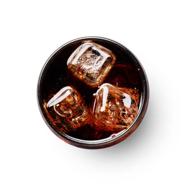 Glass of cola with ice cubes Glass of cola with ice cubes isolated on white background. Take away soda drink. Top view flat lay carbonated photos stock pictures, royalty-free photos & images