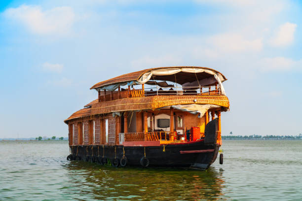 A houseboat sailing in Alappuzha backwaters in Kerala state in India
