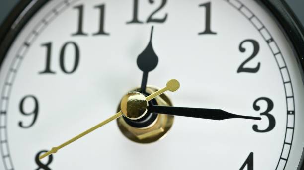 istock Clock face view Time running out concept. Close up of table business timer. Every minute counts idea. 1266663913