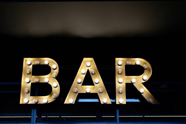 istock Yellow light bar sign. Bar word. 1266664044