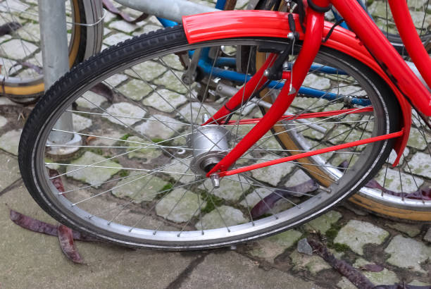 istock Close up view at a bicycle wheel with several metal spokes 1266665532