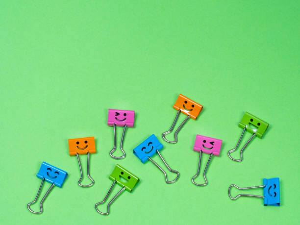 istock Multicolored different funny smile metal binder clip 1266667036