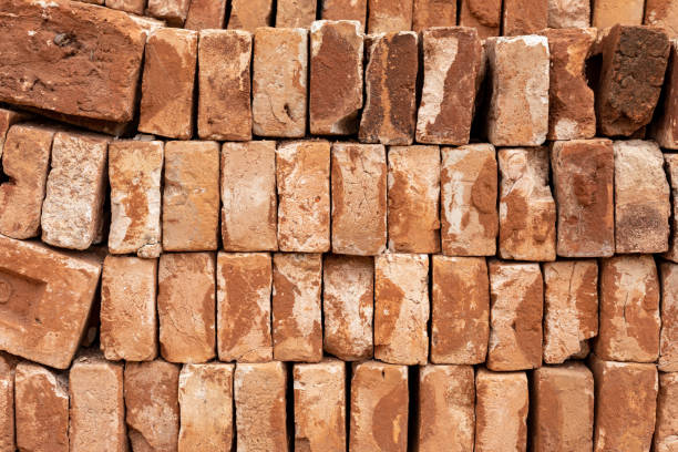 istock Exposed brick wall or wall, with apparent mortar. Texture for backgrounds 1266667926