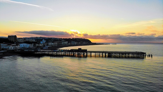 Looking east at hastings pier at Sunrise