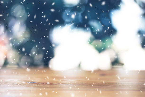 Wooden floor and defocused winter landscape on background