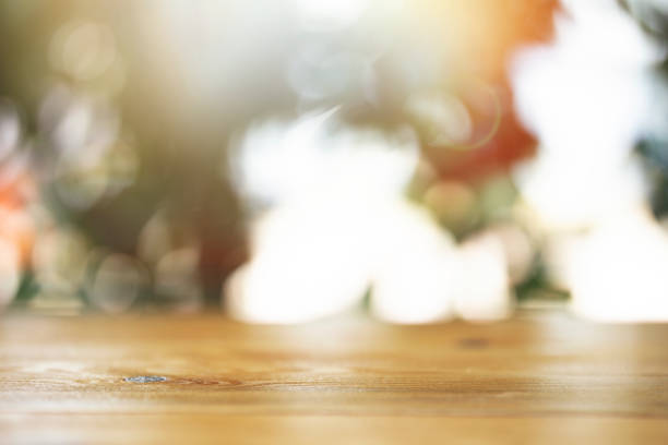 Wood table top on light blur background empty brown wood table