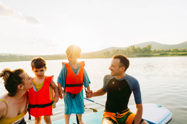 istock Learning paddling with our mom and dad 1266673154