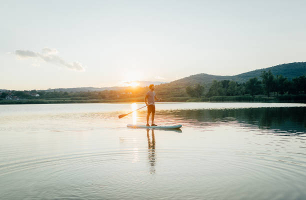 istock Stand-up paddleboarding on the lake 1266673913