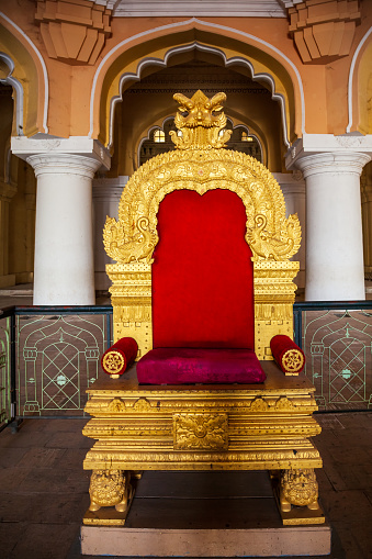 MADURAI, INDIA - MARCH 23, 2012: King throne inside the Thirumalai Nayak Palace in Madurai city in Tamil Nadu in India