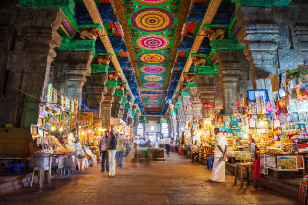 Thousand pillar hall, Meenakshi Temple MADURAI, INDIA - MARCH 23, 2012: Small souvenir market inside the Meenakshi Temple, a historic hindu temple in Madurai city in Tamil Nadu in India menakshi stock pictures, royalty-free photos & images