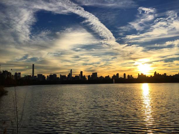 istock Manhattan Skyline - spectacular sky 1266679836