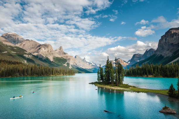 Spirit Island on Maligne Lake in Jasper National Park, Alberta, Canada Jasper National Park, Alberta, Canada, Spirit Island on Maligne Lake during summer. rocky mountains banff alberta mountain stock pictures, royalty-free photos & images