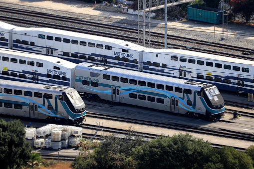 Los Angeles, California, USA - August 15, 2020: Stored Metrolink trains.\n\n\nAll the public transportations have a tough time during COVID-19 pandemic.