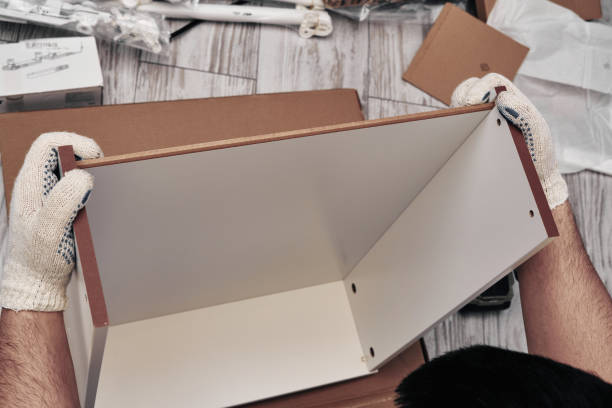 istock Furniture assembly process. The process of assembling cabinets and shelves. Do it yourself. 1266683983