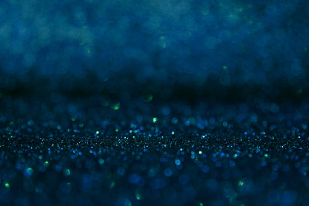 istock Glitter blue background holiday blur christmas 1266685054