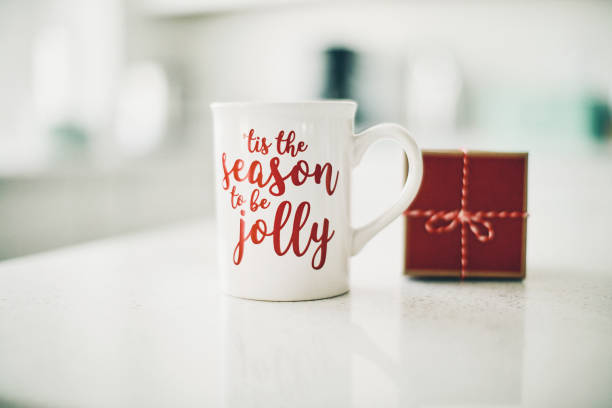 Bright modern kitchen with Christmas gift and mug