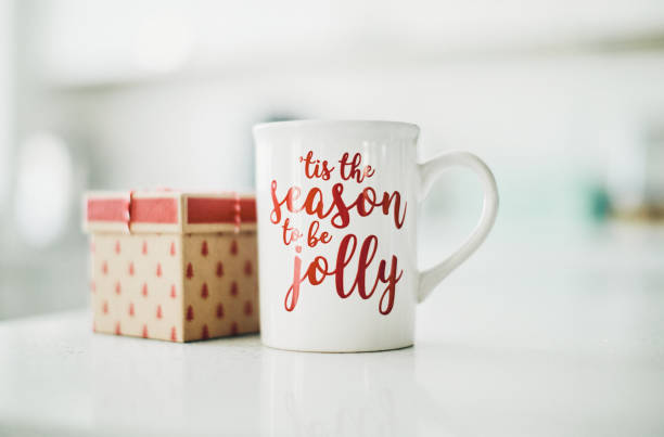Bright modern kitchen with Christmas gift and mug