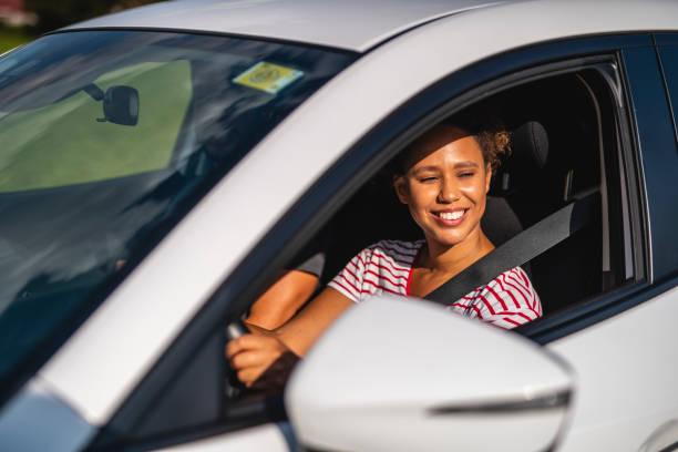 istock Close up of a confident female driver 1266692657