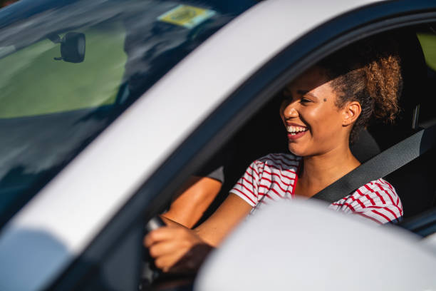 istock Close up of a confident female driver 1266692763