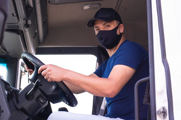 istock Brazilian truck driver inside a truck 1266696061