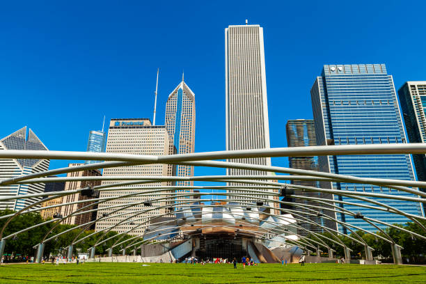 Jay Pritzker Pavilion Chicago, Illinois USA - August 21, 2011: Skyline view of the popular Jay Pritzker Pavilion in Millennium Park in the downtown district. millennium park stock pictures, royalty-free photos & images