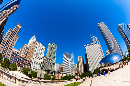 Chicago, Illinois USA - August 21, 2011: Skyline fish eye view of the popular Millennium Park in the downtown district.