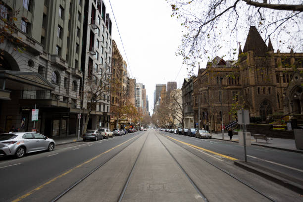 A view of Collins Street during peak hour during COVID-19 in Melbourne, Australia. Stage 4 restrictions continue in Melbourne as life drains away from the city now that work permits are being enforced. Premier Daniel Andrews once again failed to answer questions on his administrations failures that led to over 180 deaths in his state. Victoria recorded a further 450 new COVID-19 infections along with 11 deaths overnight.