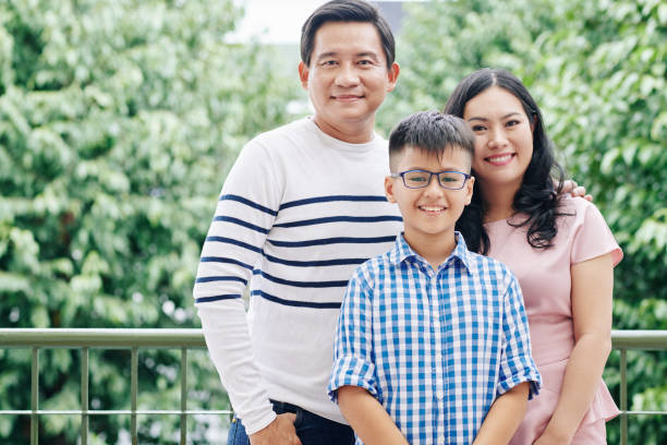 istock Happy Vietnamese family 1266701925