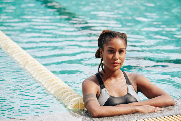 istock Pretty female swimmer 1266705352