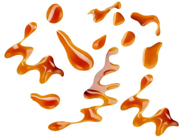 istock Caramel sauce  set isolated on white background. Liquid melted caramel or maple syrup top view. Collection 1266707045