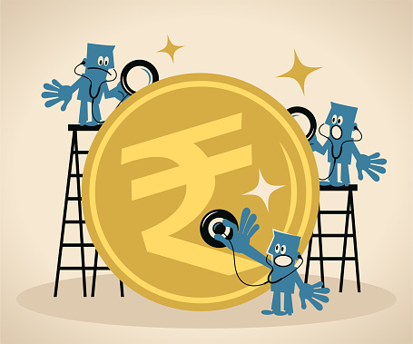 Business Blue Little Guy Characters Vector Art Illustration.
Financial advisors team listen to and analyze a big Indian Rupee currency with a stethoscope, concept of monetary analysis.