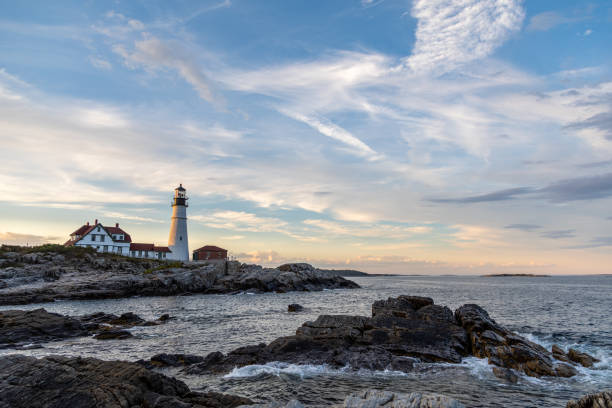 istock Portland Head Lighthouse at Fort Williams State Park at Sunset 1266708788