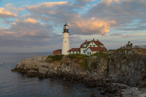 istock Portland Head Lighthouse at Fort Williams State Park at Sunset 1266708792