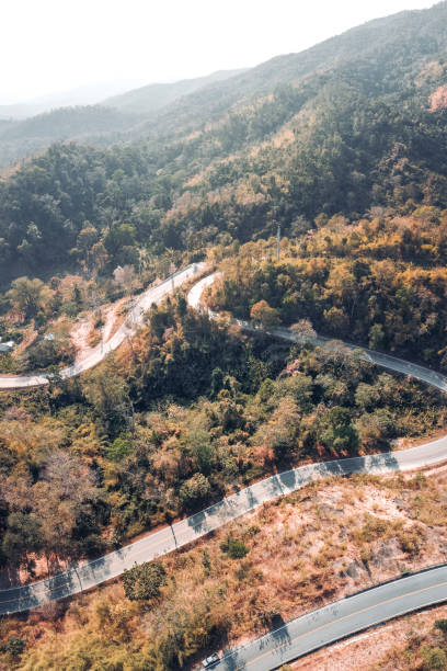 istock Winding up the mountain road Bird View 1266709953