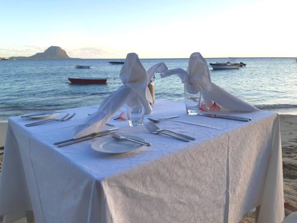 istock Attractive table nicely set for a romantic diner in a fantastic environment. 1266712006