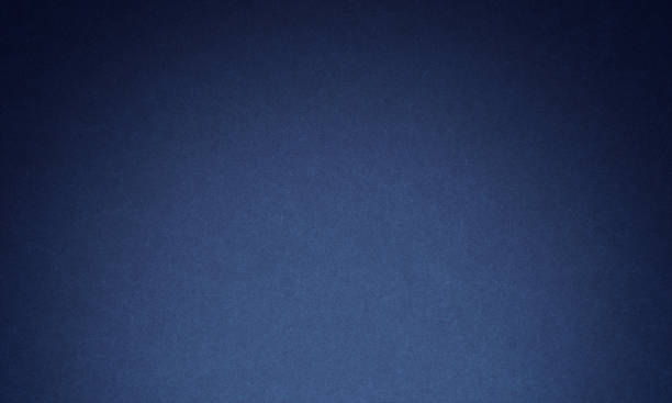 istock Texture of old navy blue paper closeup 1266713633