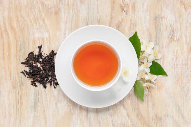 istock Tea with jasmine in a cup. Ceremony concept. Top view 1266714471