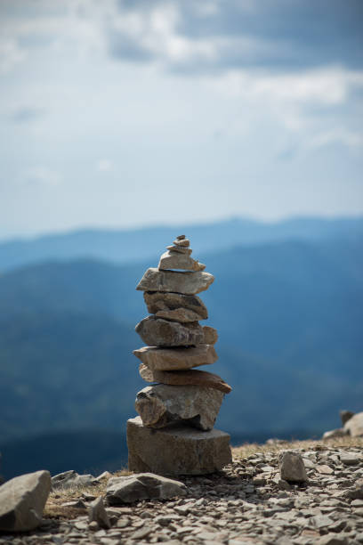 istock stone balance on mountain landscape background 1266714773