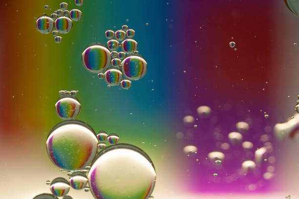 istock photo of multicolored drops on a colored background for the background 1266721840
