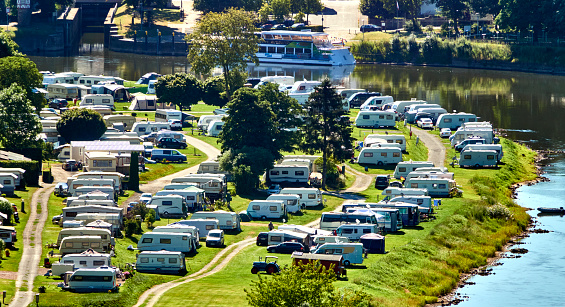 Beverungen, Germany, July 23., 2020: Aerial view of a site for caravans and mobile homes on the banks of the river Weser