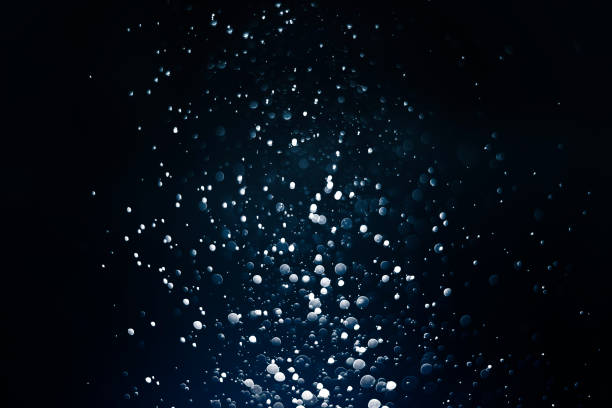 istock Abstract, Bokeh light, dust glitter on dark or black background. 1266725171