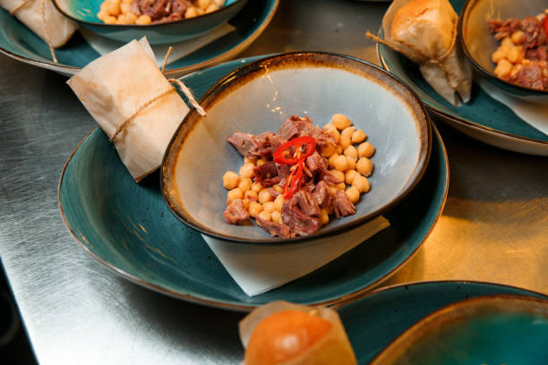 istock The process of attracting soup from chickpea and meat 1266725850