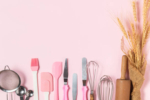 istock Kitchen utensils for pastries on pink  background, 1266727430