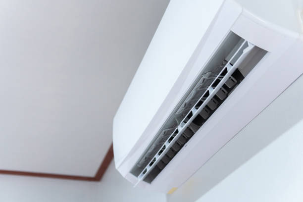 istock cool air conditioner system on white wall room 1266731748